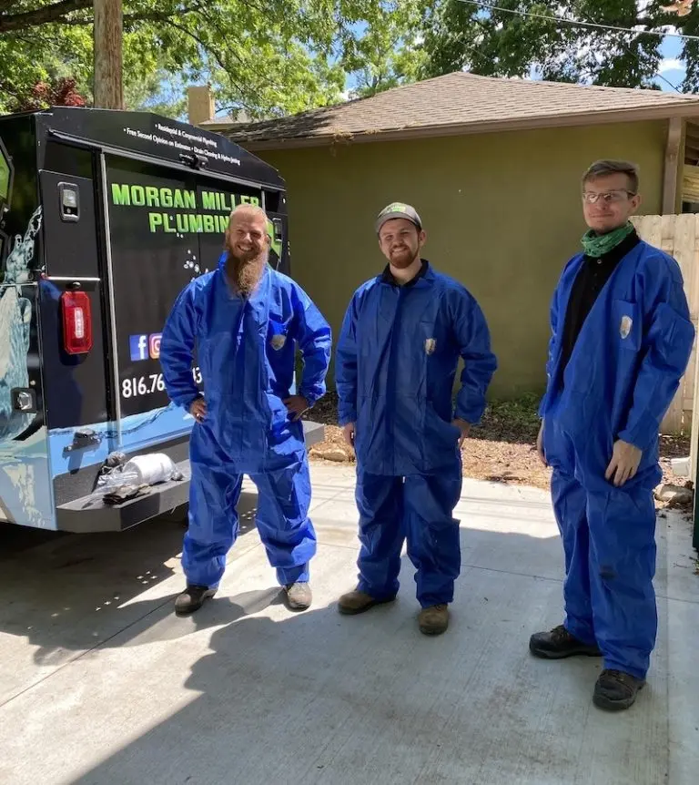 Morgan Miller Plumbing employees in blue jumpsuits