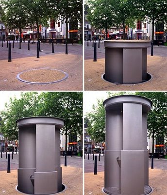 Outdoor toilet pod that comes up from underground